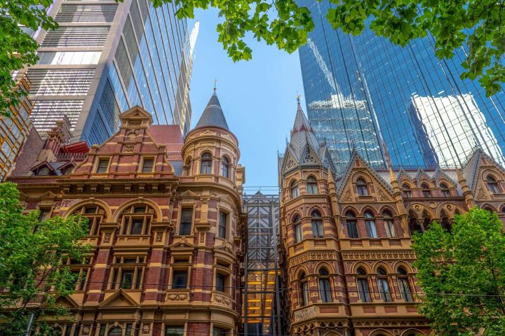 Collins street gothic towers Victorian Gothic bank buildings on Collins Street, Melbourne, beneath glass office towers