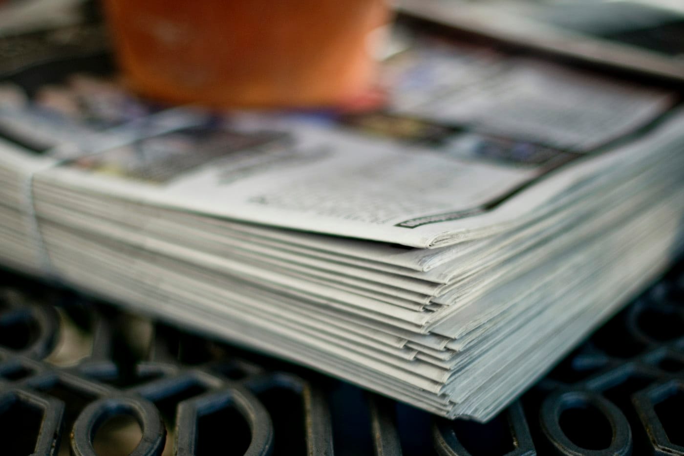 Pile of folded newspapers